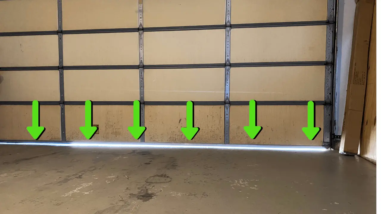 How to Adjust the Gap at the Bottom of a Garage Door - Everyday Home Repairs